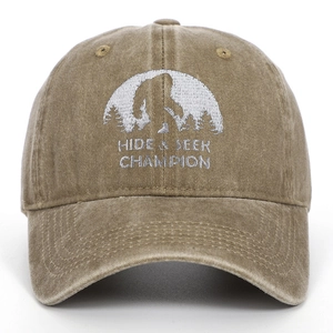 Vintage washed khaki baseball cap with white Bigfoot Hide and Seek embroidery