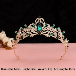 Detail view of Baroque gold crown with green rhinestones showing dimensions 14x5cm