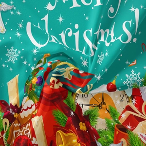 Close-up of festive tapestry fabric showing Merry Christmas print and holiday elements