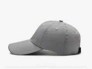 Side view of gray outdoor sun hat with long brim and adjustable strap buckle detail