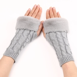 Detailed knit cable pattern and faux fur trim on light grey winter fingerless gloves