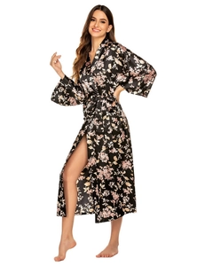 Detailed view of the elegant satin floral bathrobe with wide sleeves and high side slit