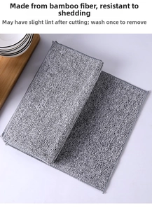 Detail of gray bamboo fiber cleaning cloth with fine loop texture and reinforced edges