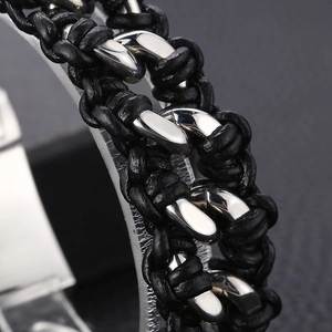 Men's black braided leather bracelet with polished silver stainless steel link clasp