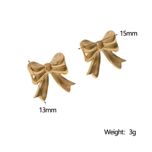 Detailed view of gold bow earrings showing dimensions 15mm by 13mm and 3g weight