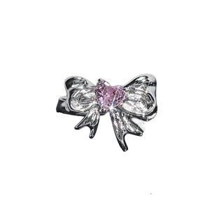 Silver bow ring with a pink heart zircon center and sparkling pavé accents for women