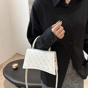 White quilted PU leather handbag with gold rivets and woven handle for women