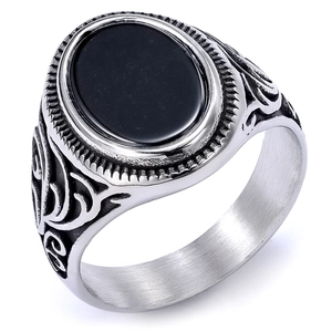 Vintage men's silver ring with large oval black stone and engraved punk style patterns