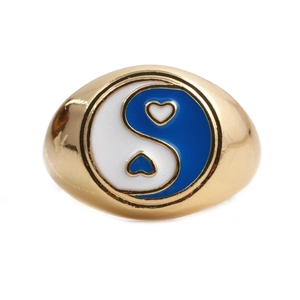 Detailed view of the gold signet ring with heart-shaped yin yang enamel inlay