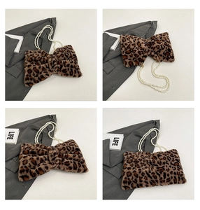Detailed views of leopard print faux fur bow bag with elegant pearl bead strap accents
