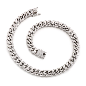 Silver titanium steel Cuban link necklace with rhinestone clasp on white background