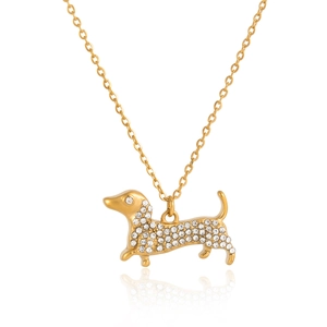 Detail of dachshund pendant necklace with sparkling rhinestones in golden finish