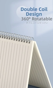 Detail of silver metal double-coil binding on B5 notebook with 360-degree rotation feature