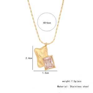 Detail of gold butterfly necklace with dimensions 40+6cm and stainless steel specs