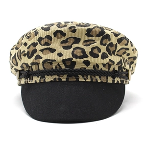 Classic leopard print newsboy cap with black brim and decorative braided rope detail
