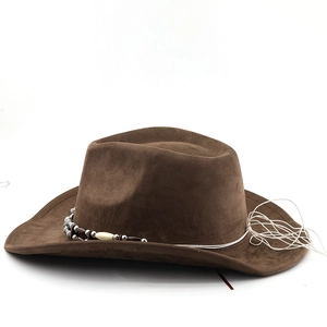 Detail of a brown suede cowboy hat featuring a handcrafted ethnic beaded decorative band