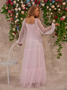 Pink maternity mesh maxi dress with puff sleeves and tiered skirt back view