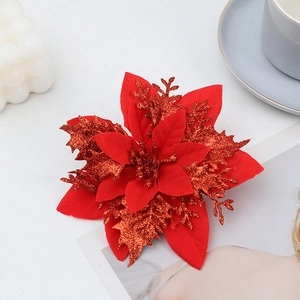 Detailed macro view of artificial red silk flower petals with shimmering glitter texture
