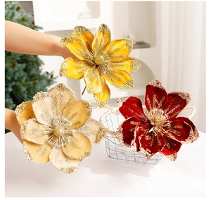 Close-up of glitter-edged magnolia flowers in yellow, champagne and burgundy colors