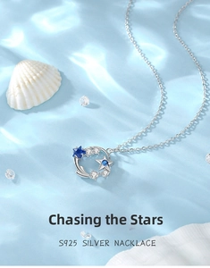 Macro detail of S925 silver necklace with blue star zircon and hollow circle pendant
