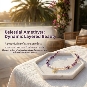 Detailed close-up of amethyst stones and freshwater pearls with a sun pendant necklace