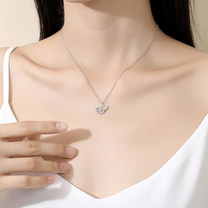 Elegant S925 sterling silver ginkgo leaf necklace with sparkling cubic zirconia on model