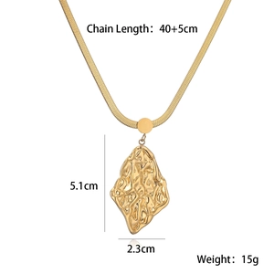 Detail view of gold snake chain necklace with irregular geometric pendant dimensions