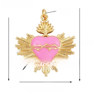 Detailed view of large gold sacred heart pendant with pink enamel and size measurements