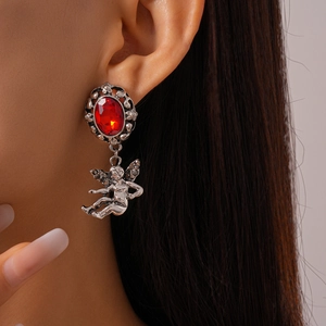 Vintage gothic earrings with red oval gemstone and silver cupid angel wings charm