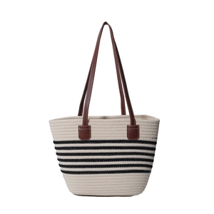 Large striped woven tote bag with brown leather straps for beach summer holidays