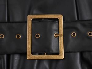 Detailed macro view of black PU leather wide belt with vintage gold square buckle and eyelets