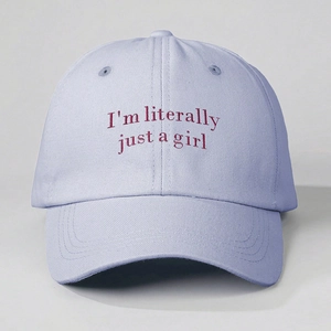 Close-up of the embroidered text on a light purple cotton twill baseball cap for women