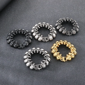 Men's gothic stainless steel skull bracelets in five metallic colors with cross clasps