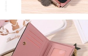 Internal layout of pink PU leather bi-fold wallet showing card slots and zipper pocket