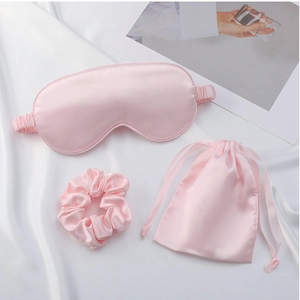 Pink silk satin sleep set including eye mask, scrunchie and drawstring storage bag