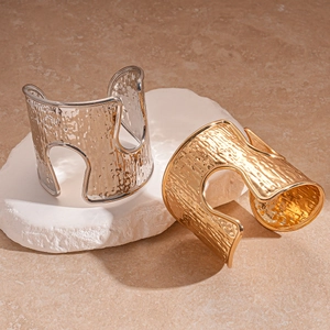 Irregular hammered metal cuff bracelets with hollow U-shape design in gold and silver