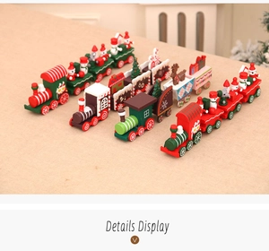 Top view of four colorful wooden Christmas train sets with festive hand-painted characters