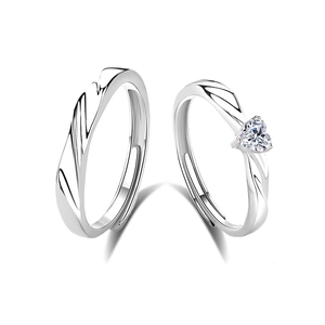 Elegant pair of S925 sterling silver couple rings with heart-shaped stone and wave texture