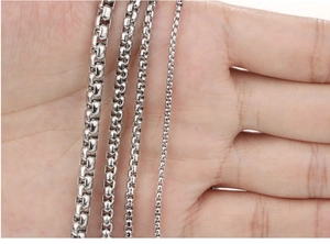 Macro detail of 304 stainless steel box chains in four different widths for men