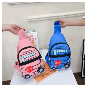 Detail of pink and blue school bus chest bags with yellow stop signs and fun patterns