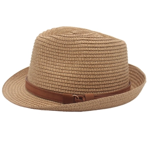 Detail of woven straw fedora hat featuring a brown leather strap and metal buckle