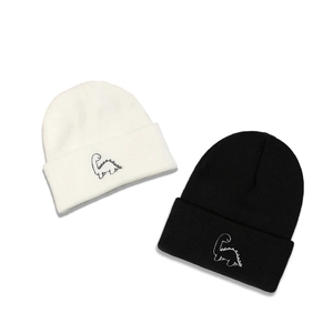 Knitted beanie set in black and white with minimalist dinosaur embroidery for autumn
