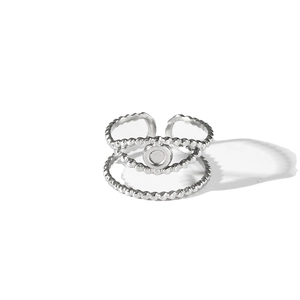 Minimalist silver multilayer beaded open ring with circular detail on white background