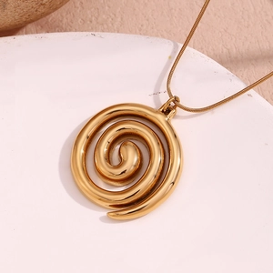 Elegant gold spiral pendant necklace on a premium stone background with fine chain