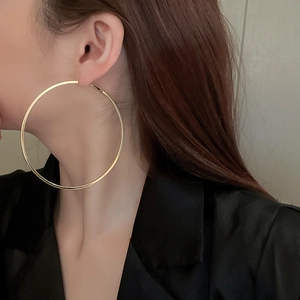 Chic oversized gold hoop earrings with metallic finish for women fashion aesthetic