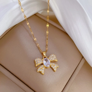 Luxurious gold butterfly necklace with micro-paved diamonds and elegant fancy chain design