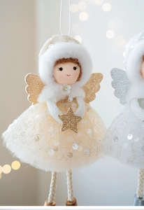 Detail of Christmas angel pendant with mesh skirt, plush hat and sparkling gold wings