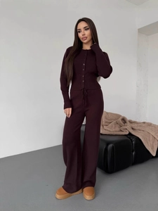 Deep purple knit two-piece set featuring long sleeve cardigan and high-waisted wide leg pants