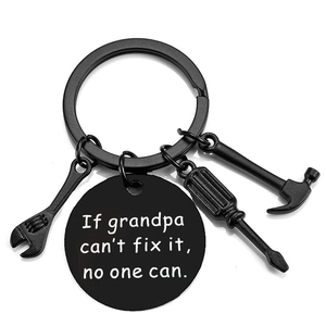 Close-up of black stainless steel keychain with tools and grandpa's gift inscription