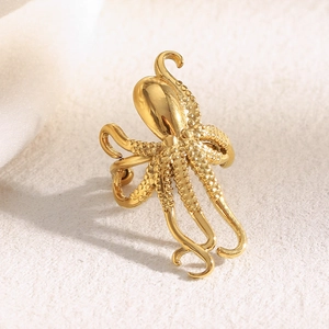 Boucle d'oreille pieuvre en acier doré 18 carats avec détails de ventouses